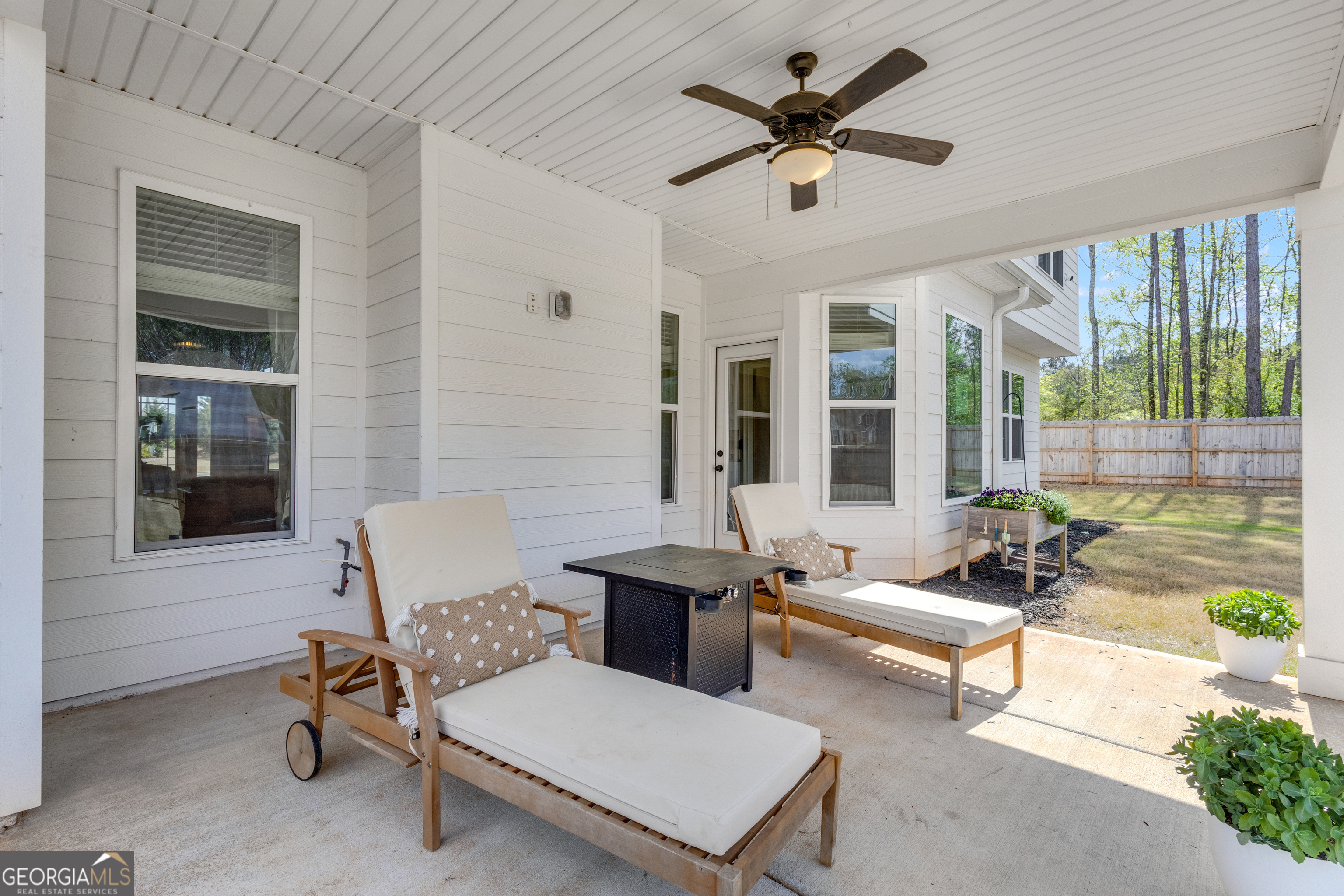 50 Cushing Street Senoia, GA 30276 - Photo 52 of 72 a living room with furniture and a large window