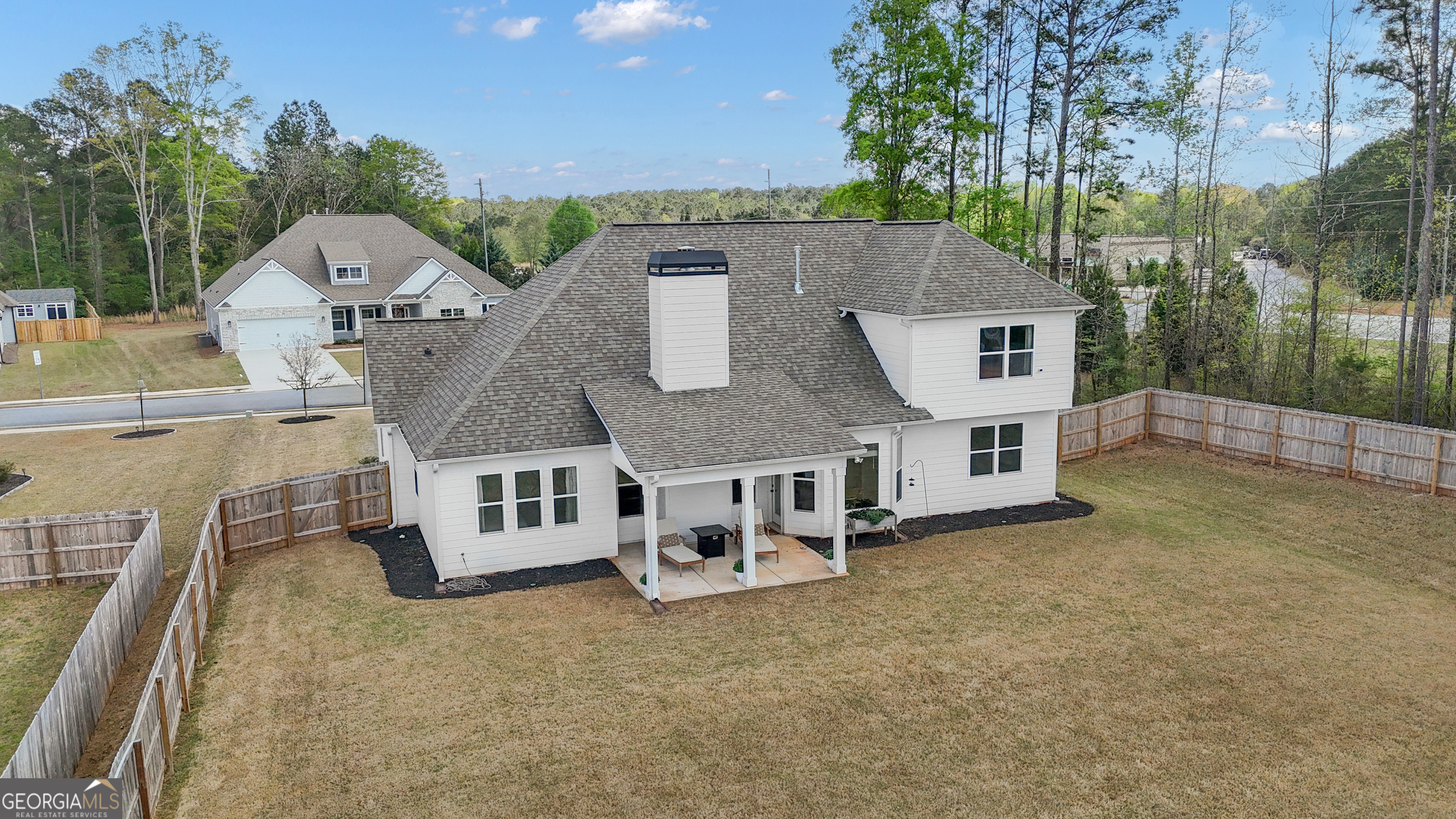 50 Cushing Street Senoia, GA 30276 - Photo 59 of 72 an aerial view of a house with a yard