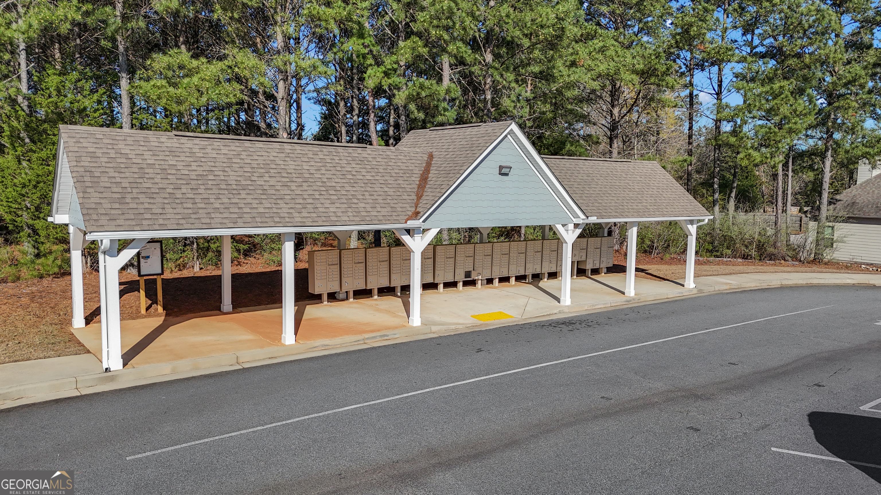 50 Cushing Street Senoia, GA 30276 - Photo 66 of 72 an aerial view of a house with swimming pool and porch