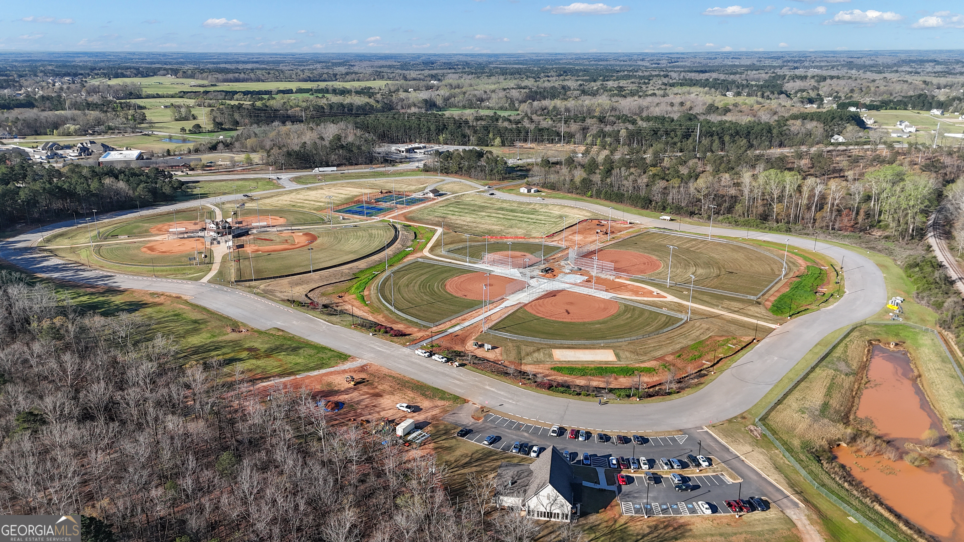 50 Cushing Street Senoia, GA 30276 - Photo 67 of 72 a view of a swimming pool with a lake view