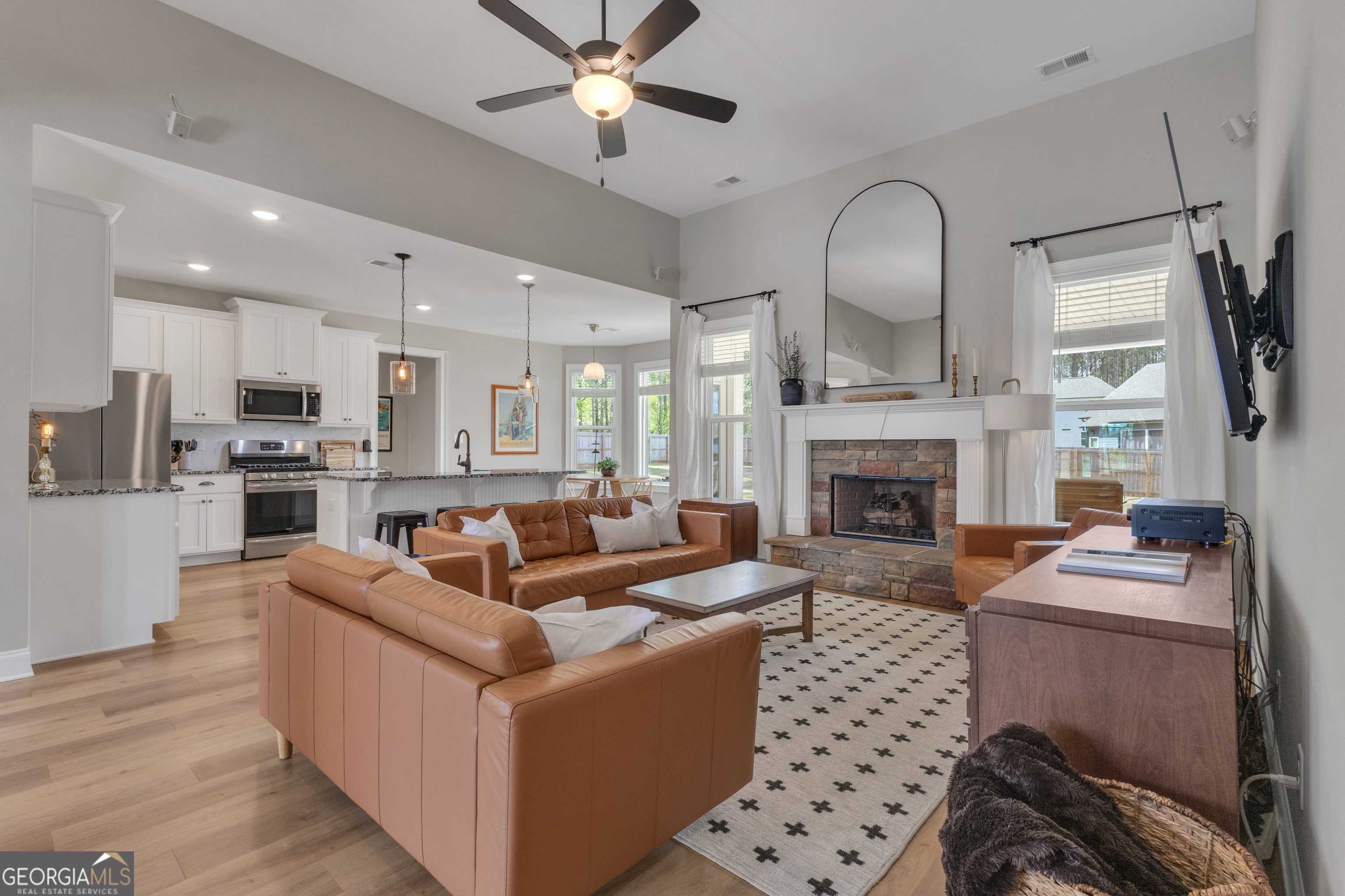 50 Cushing Street Senoia, GA 30276 - Photo 9 of 72 a living room with furniture fireplace and flat screen tv