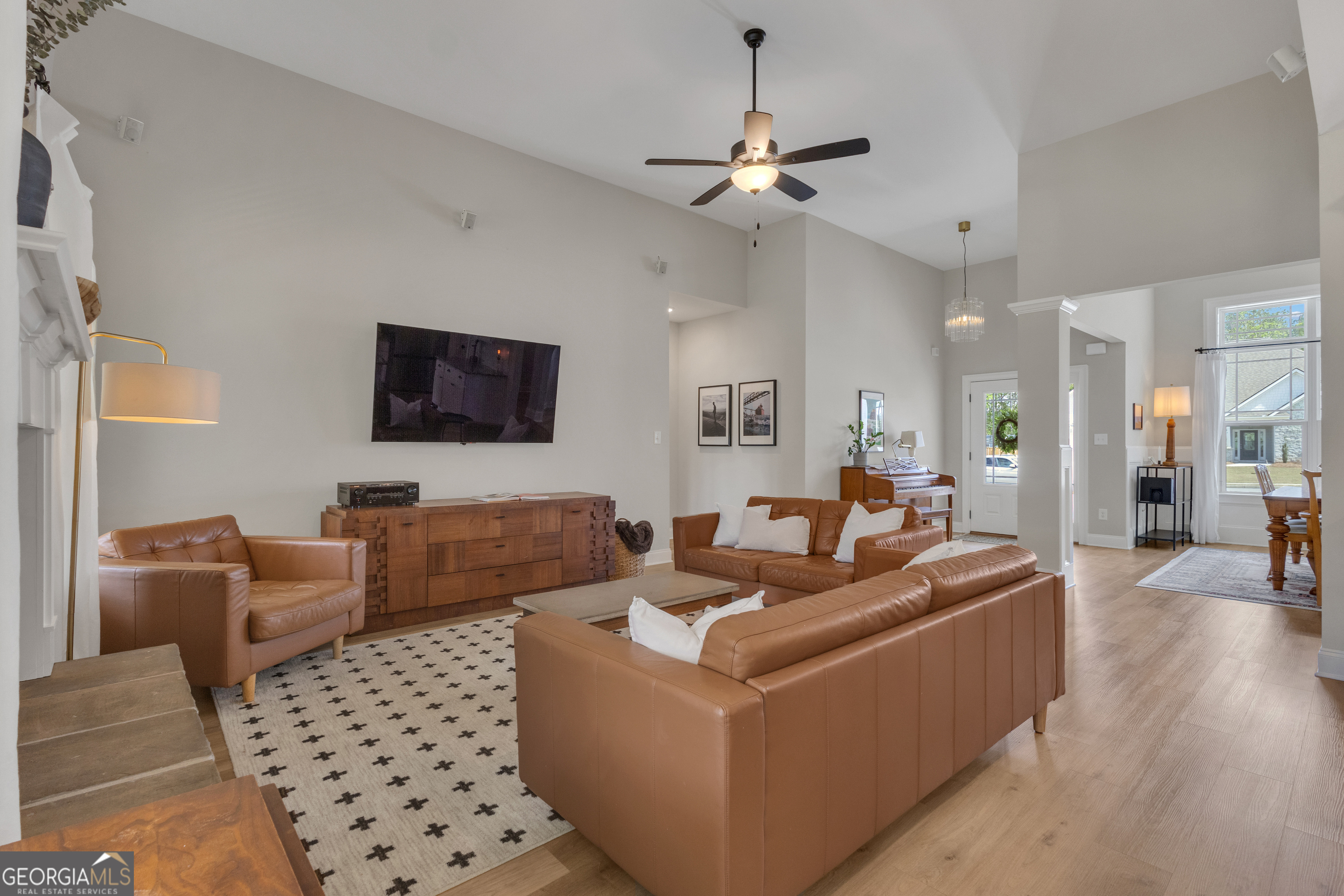 50 Cushing Street Senoia, GA 30276 - Photo 10 of 72 a living room with furniture and a flat screen tv