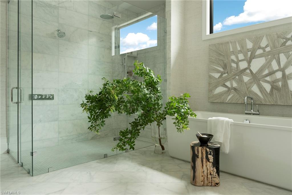 6704 Newport Road Naples, FL 34109 - Photo 19 of 47 a bathroom with a potted plant and a shower