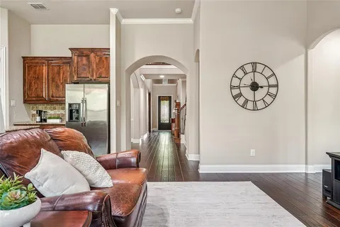 a view of a livingroom with furniture and entryway
