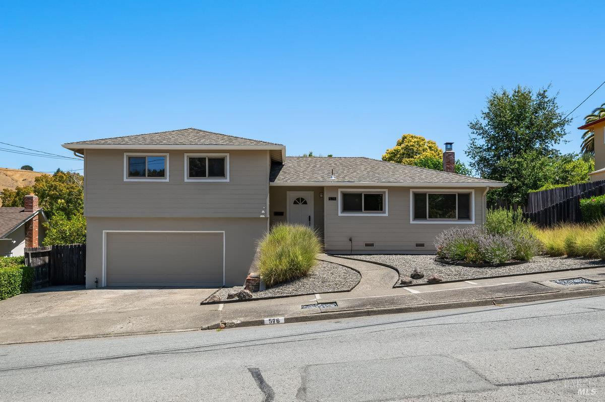 576 Montecillo Road San Rafael, CA 94903 - Photo 1 of 1 a front view of a house with a yard