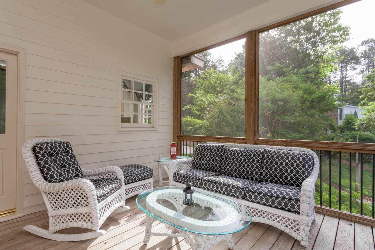 13921 Possum Track Road Raleigh, NC 27614 - Photo 16 of 25 Enjoy beautiful NC afternoons on this cozy screened porch. Screened Porch