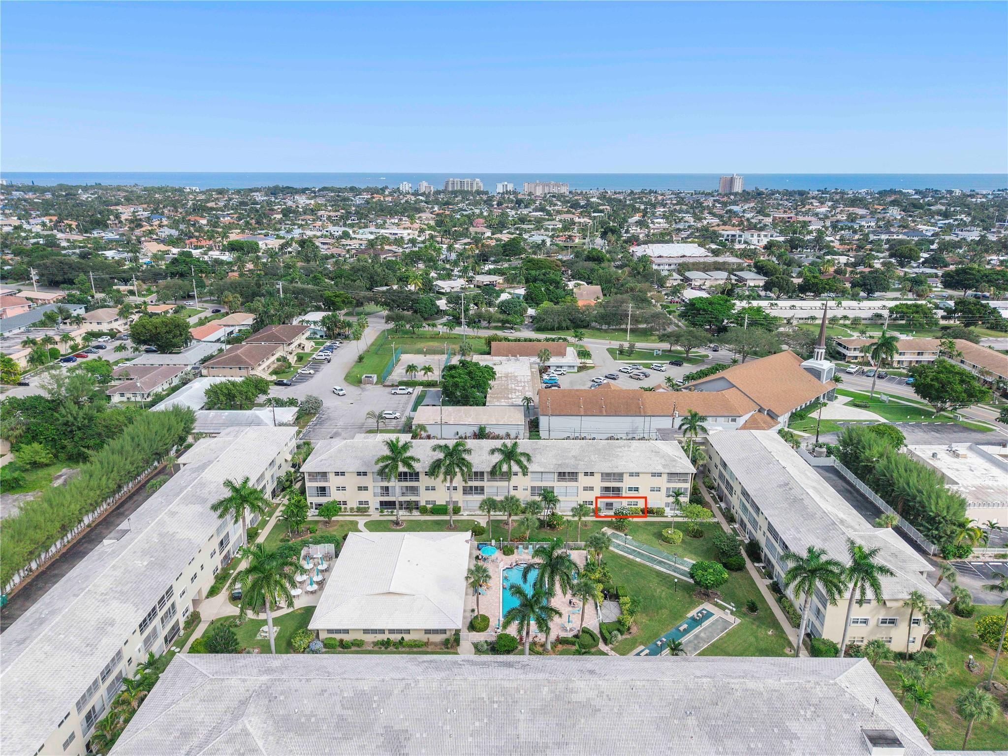 1951 Northeast 39th Street, Unit 156 Lighthouse Point, FL 33064 - Photo 31 of 43 an aerial view of a city