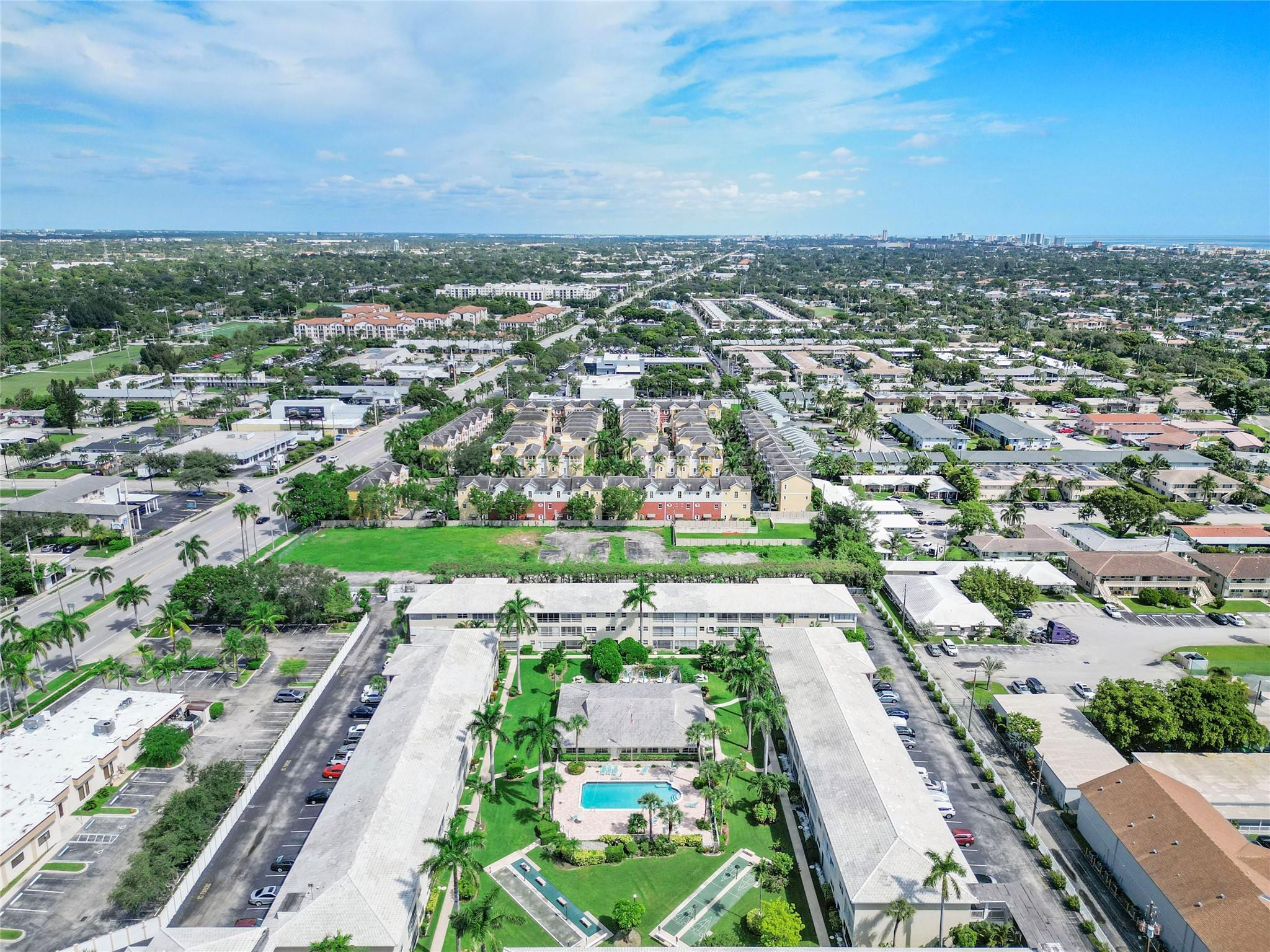 1951 Northeast 39th Street, Unit 156 Lighthouse Point, FL 33064 - Photo 32 of 43 an aerial view of a city