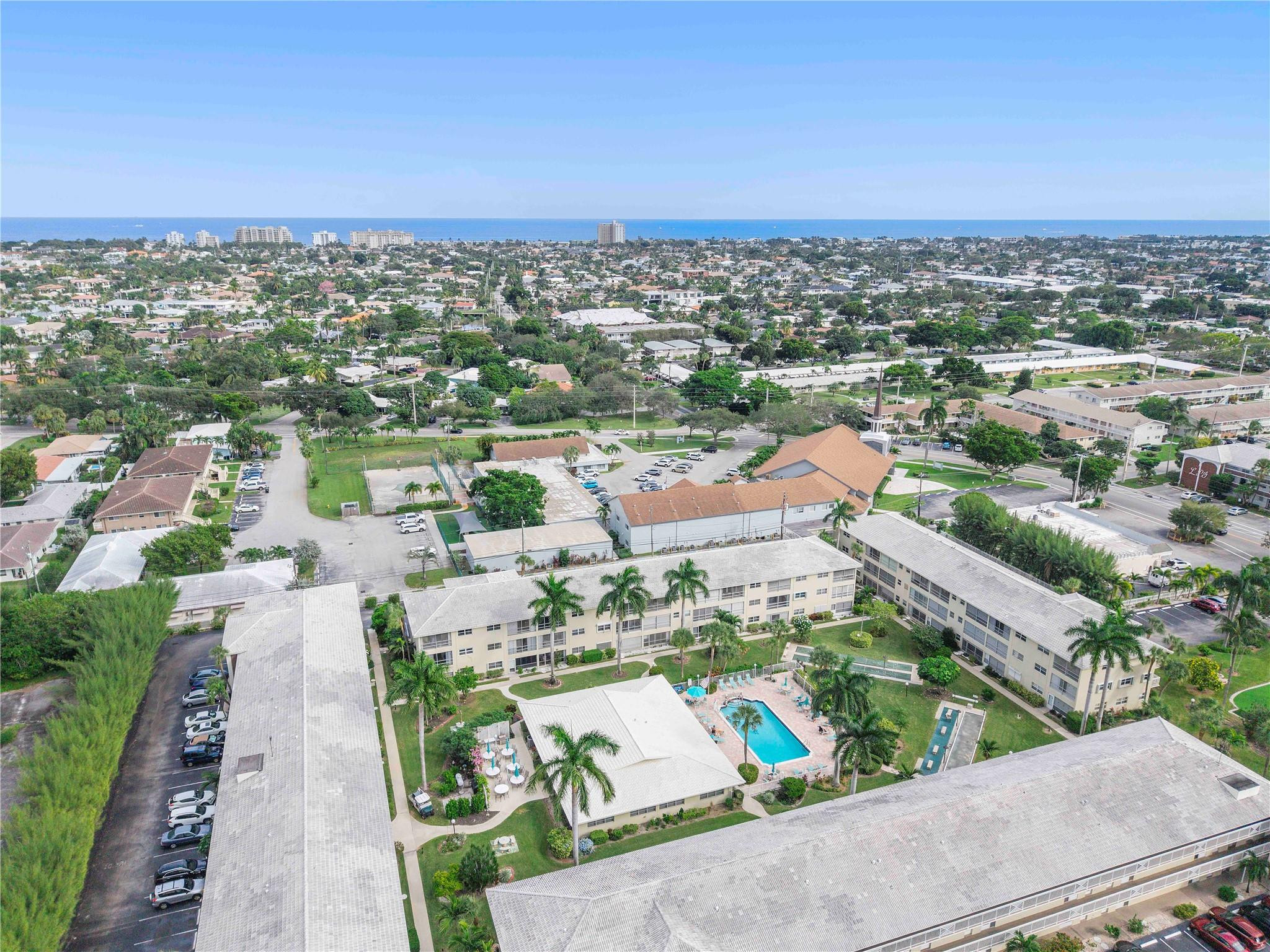 1951 Northeast 39th Street, Unit 156 Lighthouse Point, FL 33064 - Photo 39 of 43 an aerial view of a city