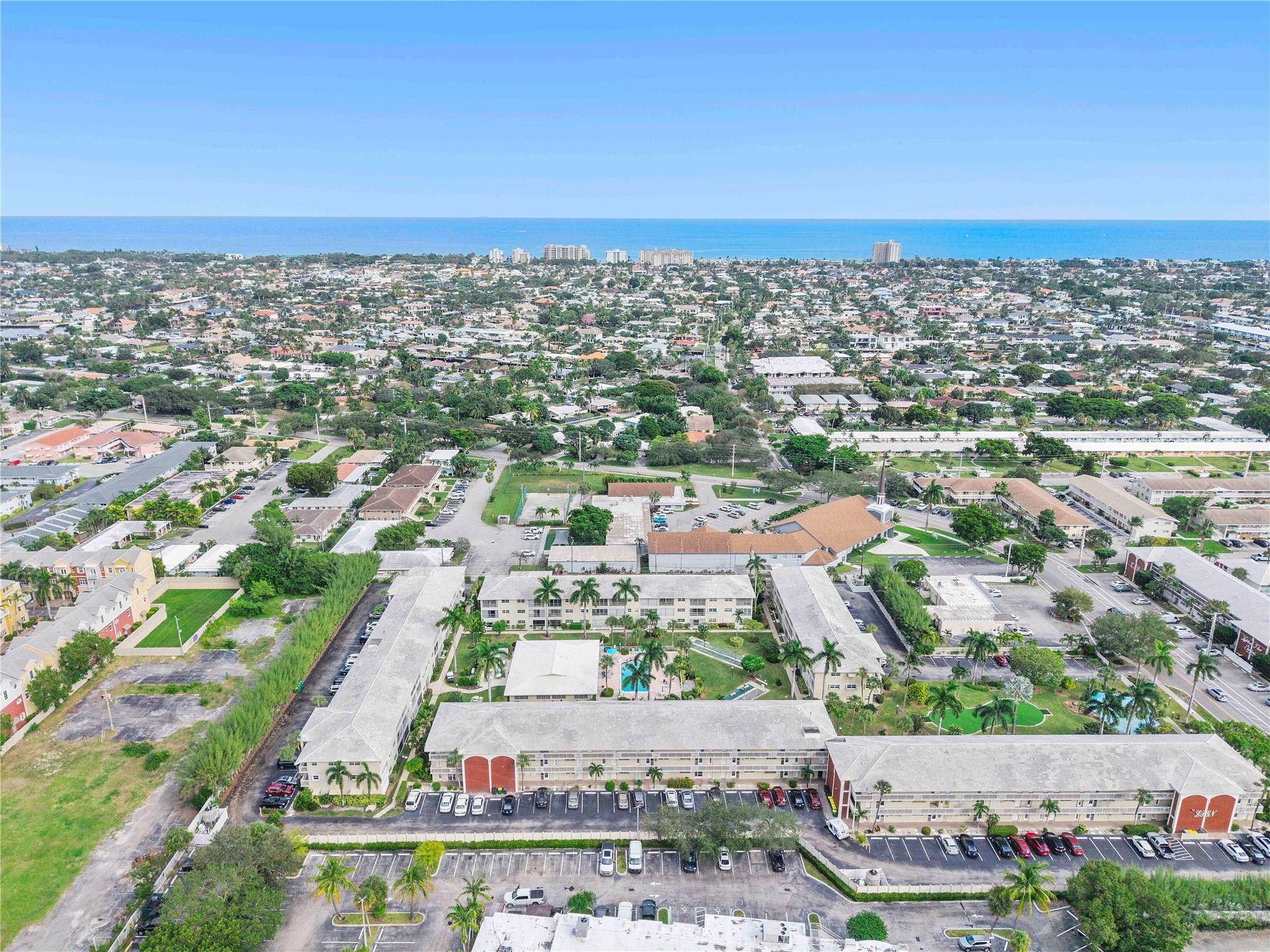 1951 Northeast 39th Street, Unit 156 Lighthouse Point, FL 33064 - Photo 41 of 43 an aerial view of a city