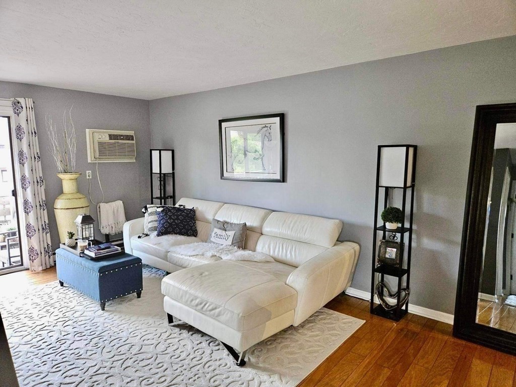 1195 Grafton Street, Unit 12 Worcester, MA 01604 - Photo 10 of 17 a living room with furniture and wooden floor