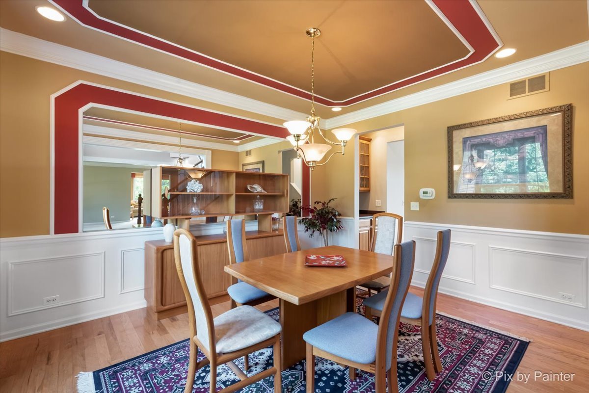 8475 Watson Circle Lakewood, IL 60014 - Photo 16 of 49 a view of a dining room with furniture and wooden floor