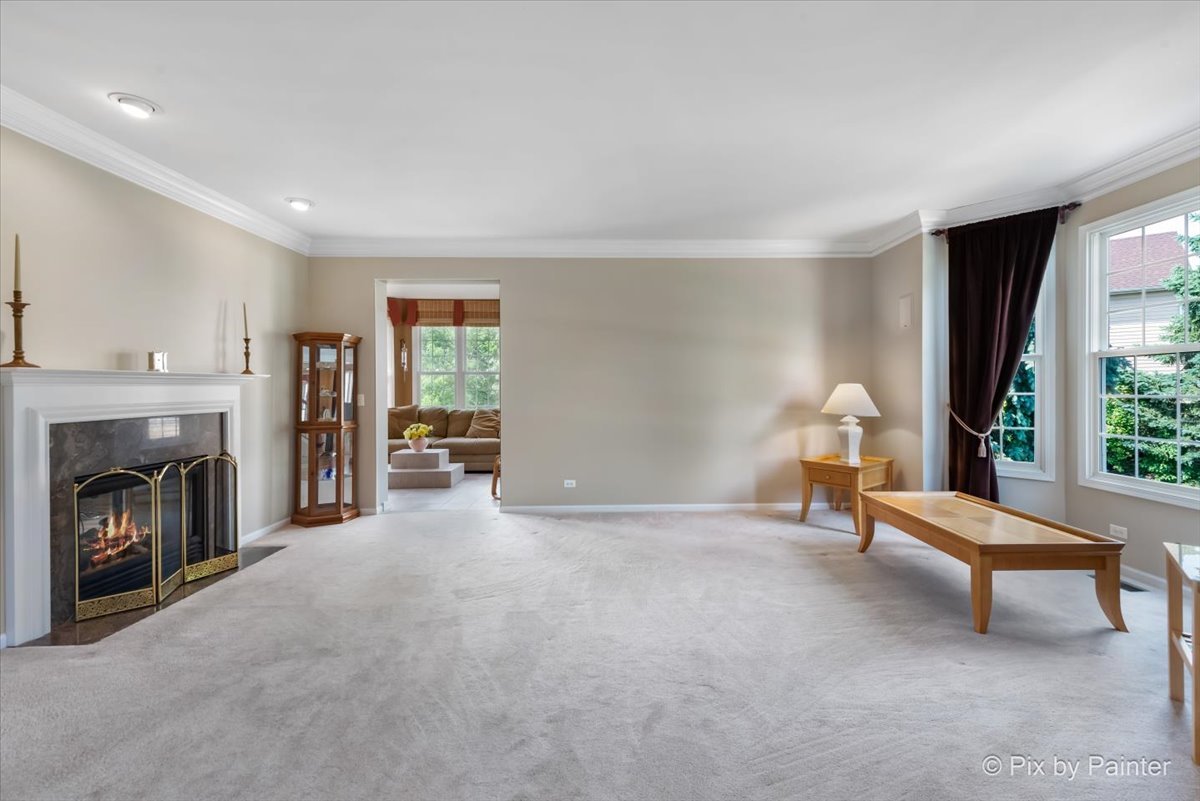 8475 Watson Circle Lakewood, IL 60014 - Photo 20 of 49 a living room with furniture and a fireplace