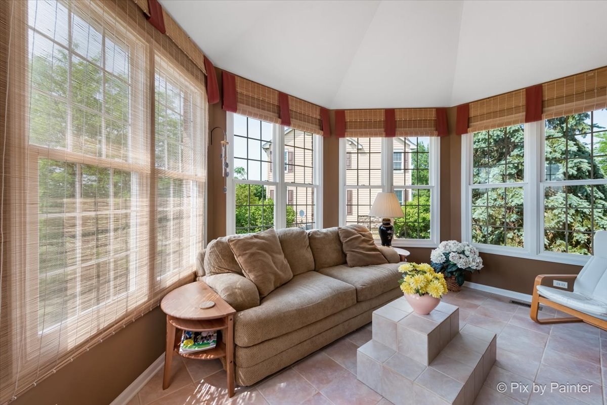 8475 Watson Circle Lakewood, IL 60014 - Photo 23 of 49 a living room with furniture and a large window