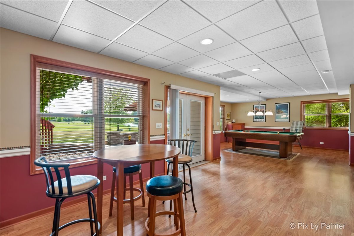 8475 Watson Circle Lakewood, IL 60014 - Photo 37 of 49 a room with furniture and a large window