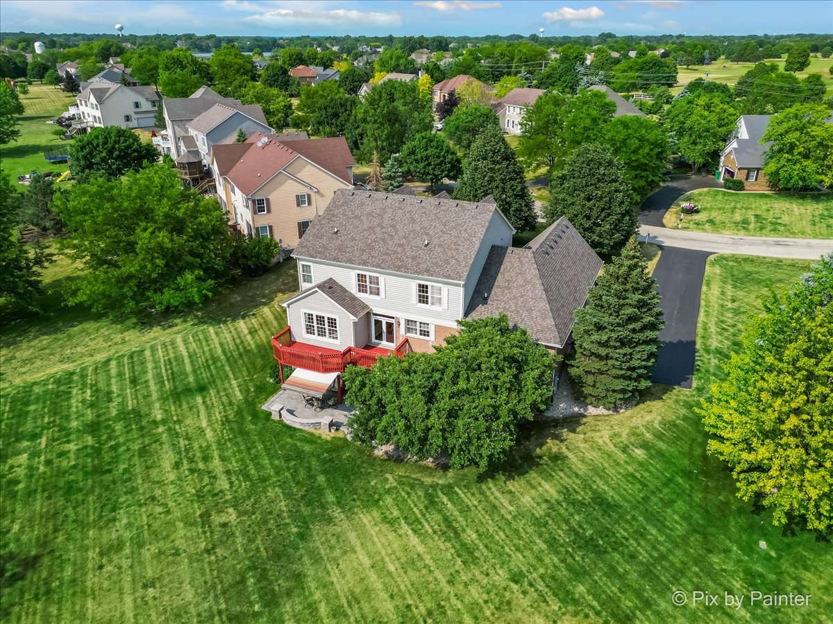 8475 Watson Circle Lakewood, IL 60014 - Photo 45 of 49 an aerial view of a house with a yard