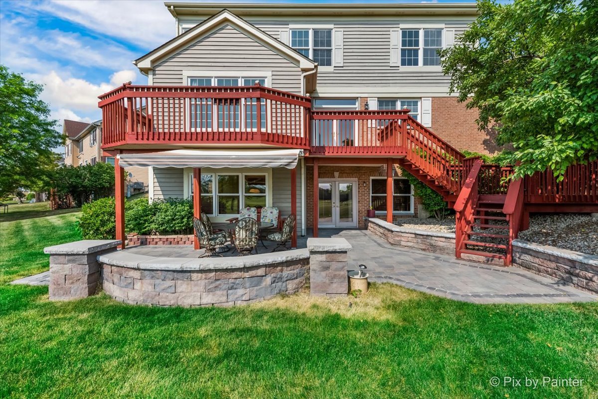 8475 Watson Circle Lakewood, IL 60014 - Photo 5 of 49 front view of a house with a yard