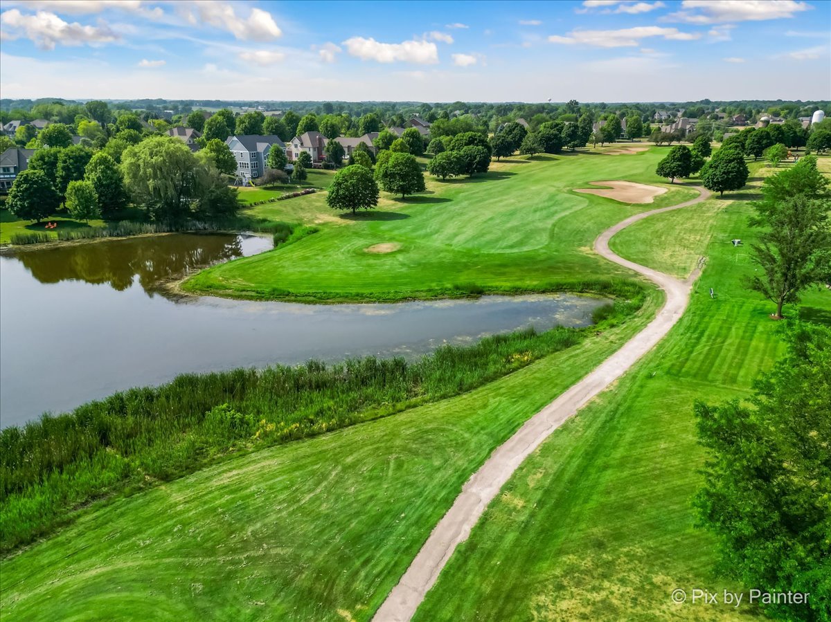8475 Watson Circle Lakewood, IL 60014 - Photo 7 of 49 a view of a golf course with a lake