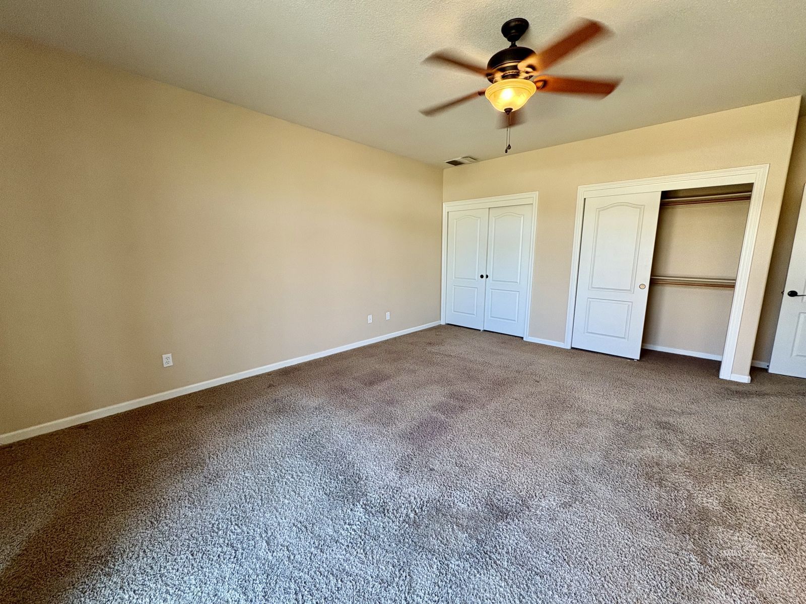 416 Olive Avenue Ridgecrest, CA 93555 - Photo 12 of 35 a view of room with a ceiling fan