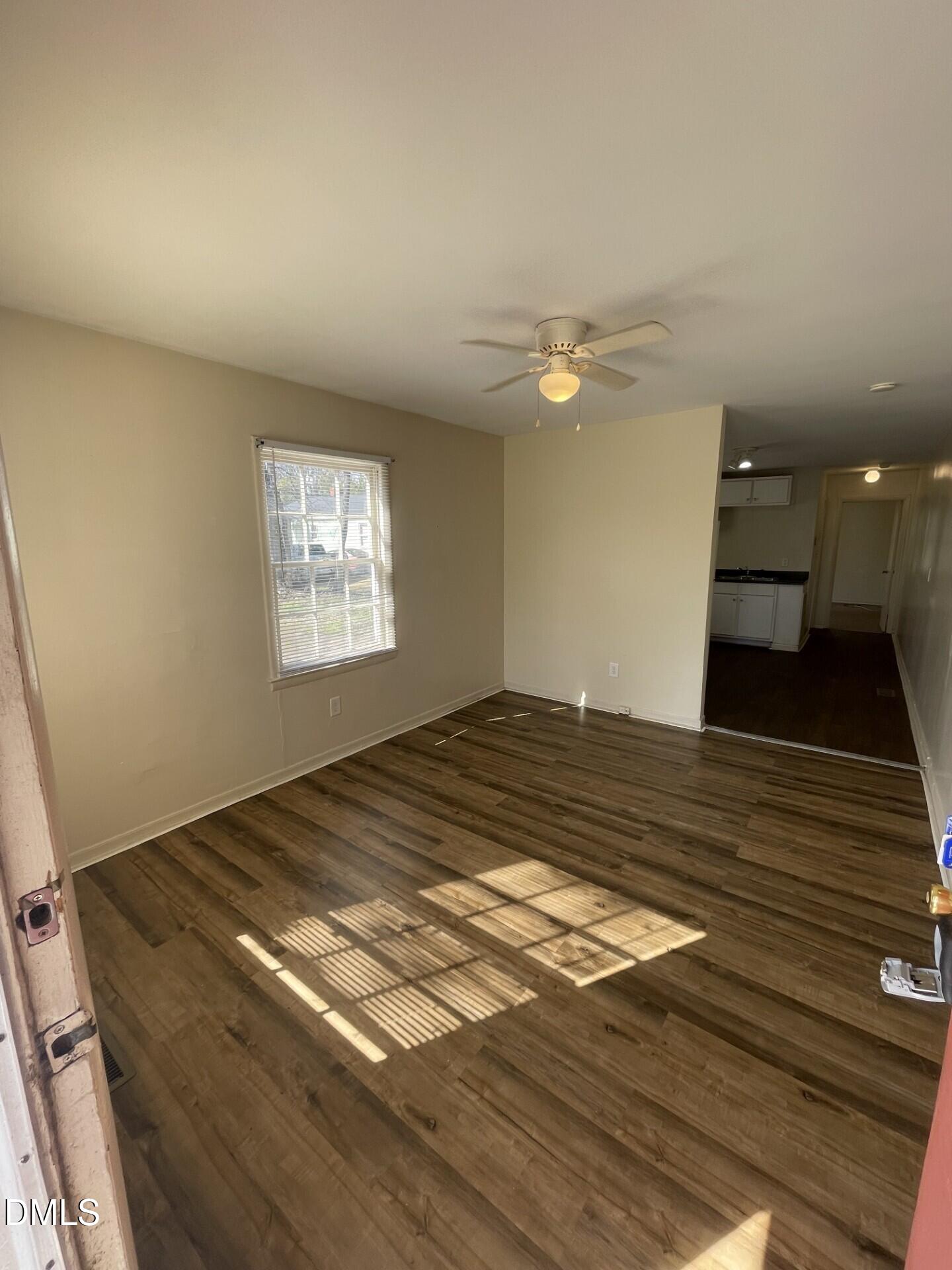 1007 Tipton Street Raleigh, NC 27610 - Photo 4 of 6 a bedroom with a bed and a window