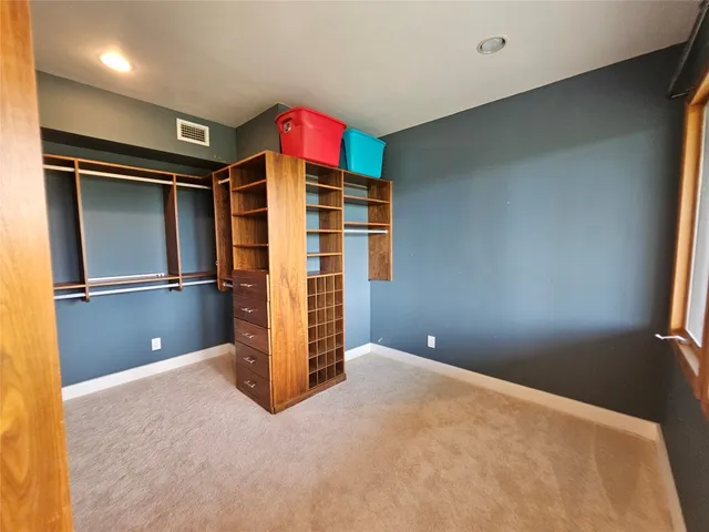a view of room with walk in closet