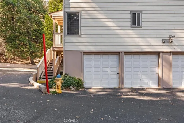 a view of a house with basketball court