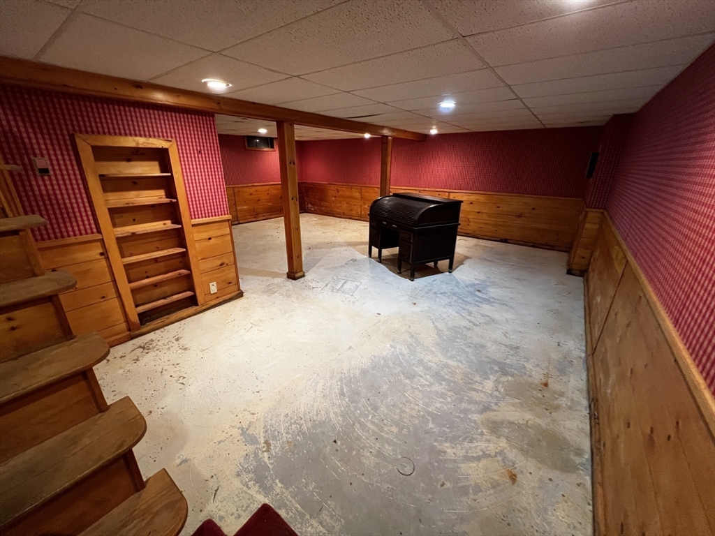 78 Redemption Rock Trail North Princeton, MA 01541 - Photo 29 of 39 a view of an empty room with furniture and a garage