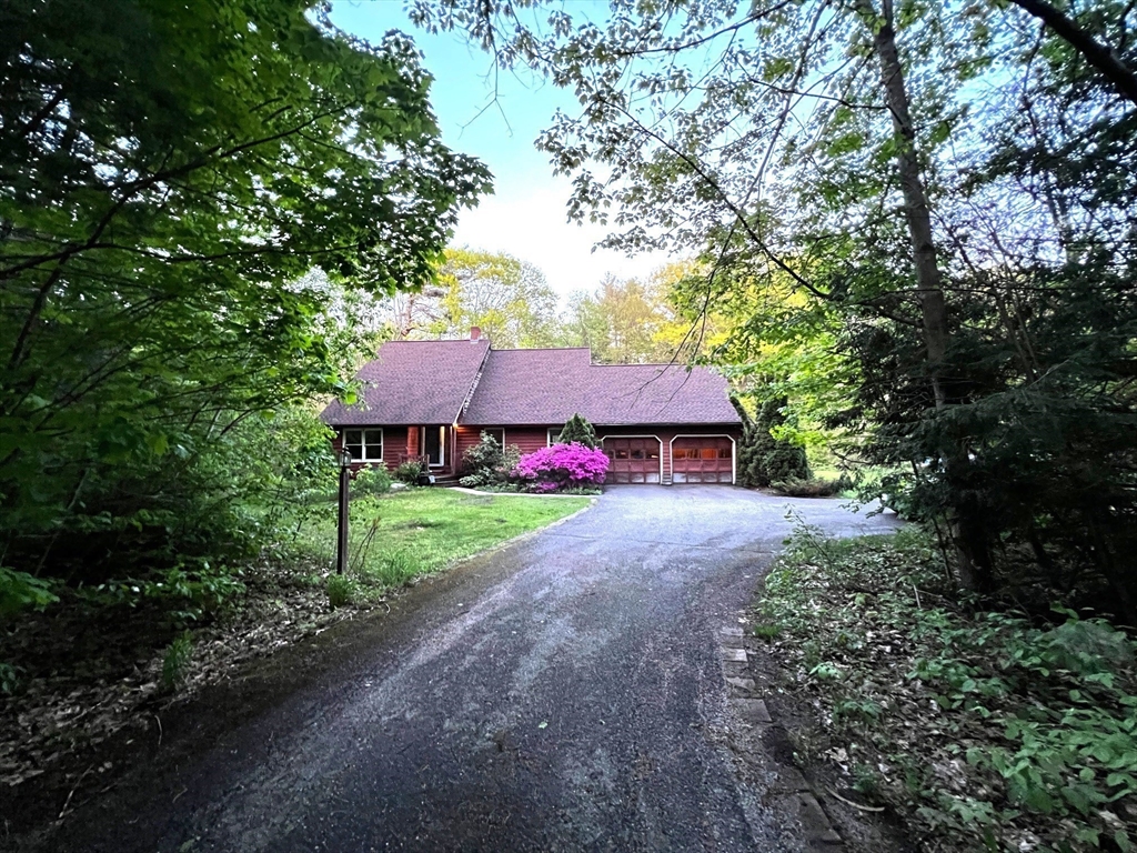78 Redemption Rock Trail North Princeton, MA 01541 - Photo 3 of 39 a view of a house with a yard and large trees