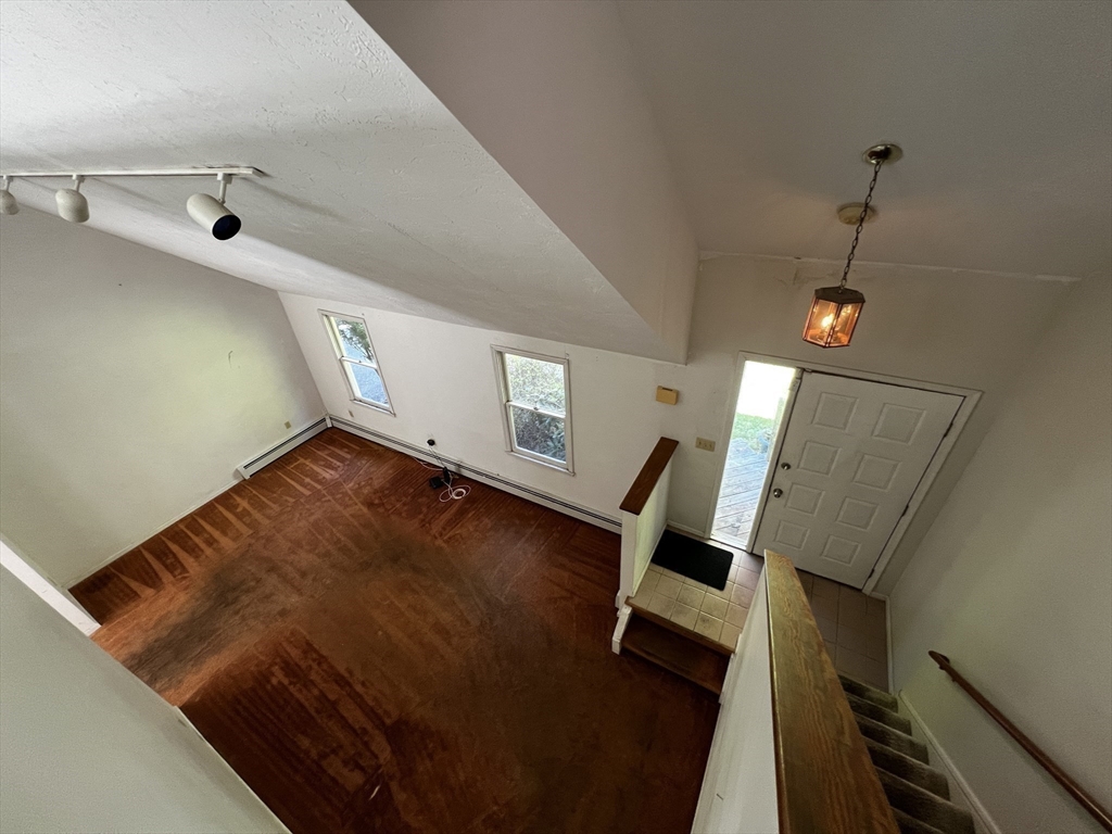 78 Redemption Rock Trail North Princeton, MA 01541 - Photo 8 of 39 a view of an empty room with stairs