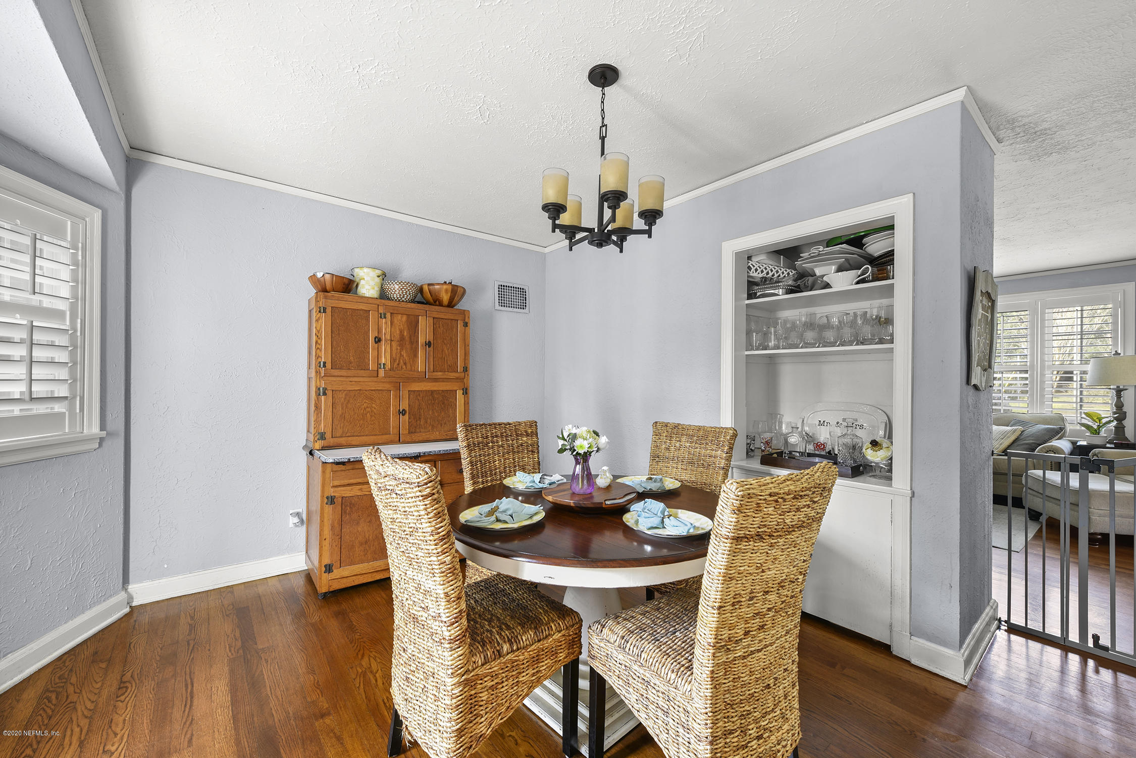 3847 Gadsden Road Jacksonville, FL 32207 - Photo 15 of 29 a view of a dining room with furniture window and wooden floor