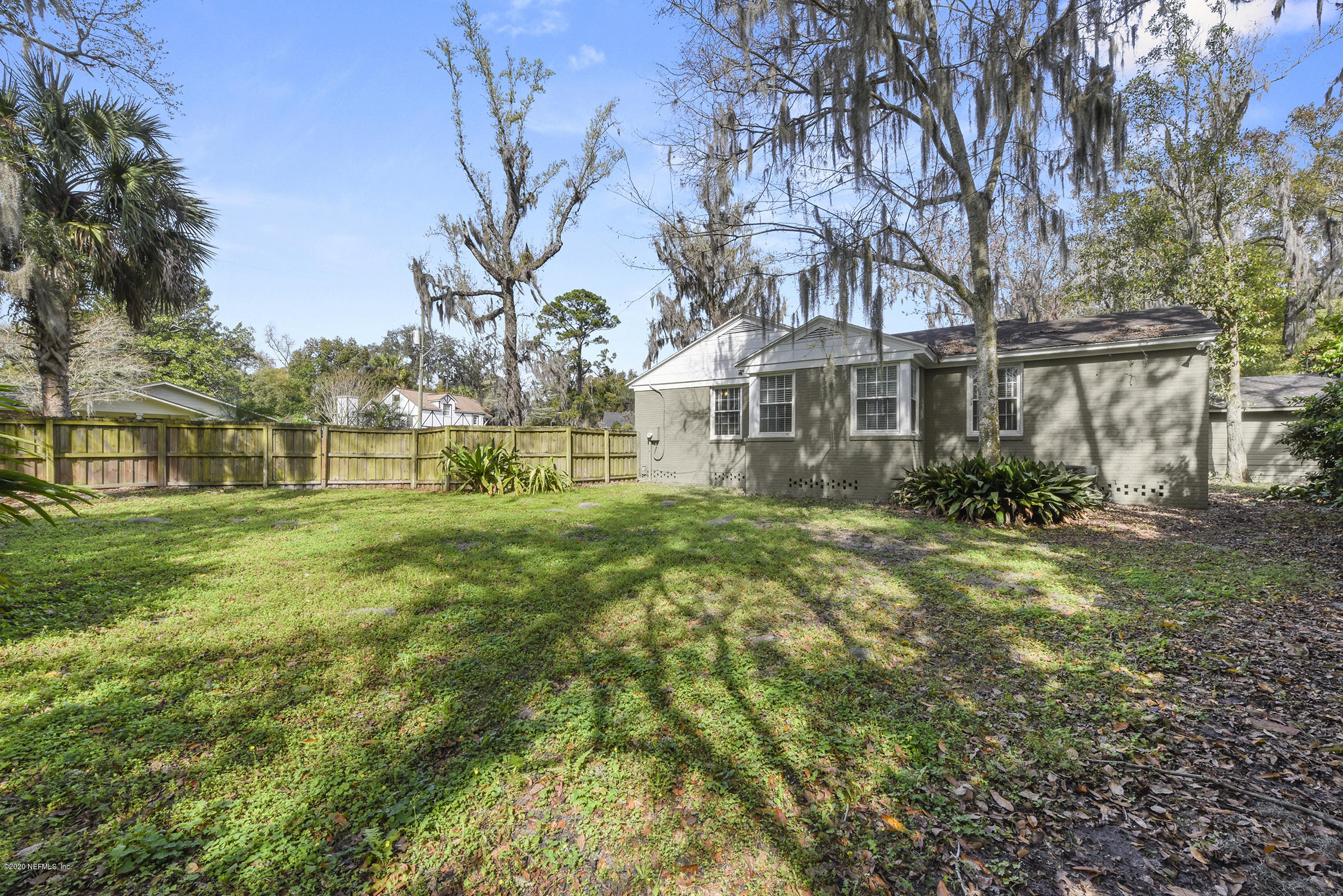 3847 Gadsden Road Jacksonville, FL 32207 - Photo 23 of 29 a front view of house with yard and green space