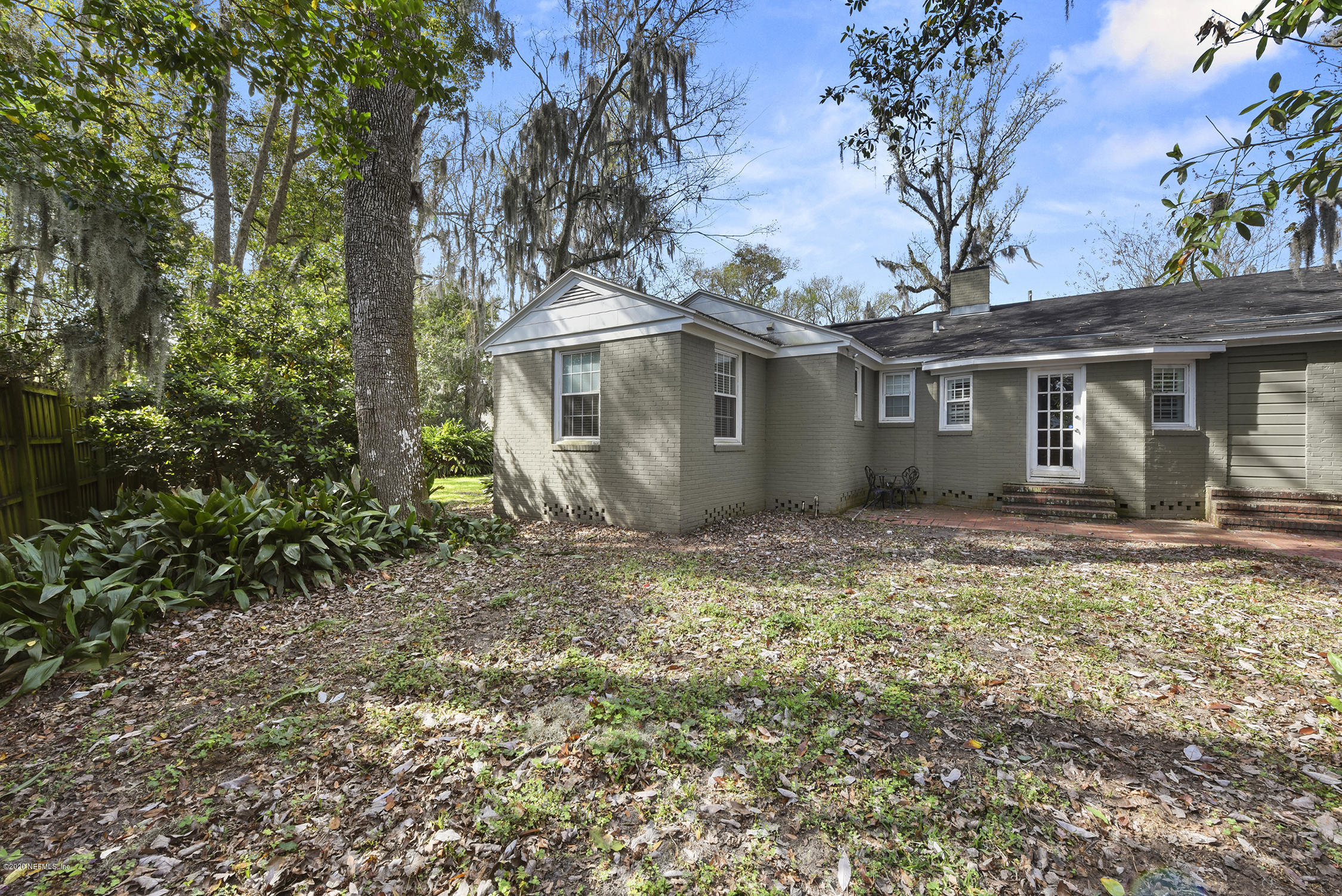 3847 Gadsden Road Jacksonville, FL 32207 - Photo 25 of 29 a view of a house with a yard