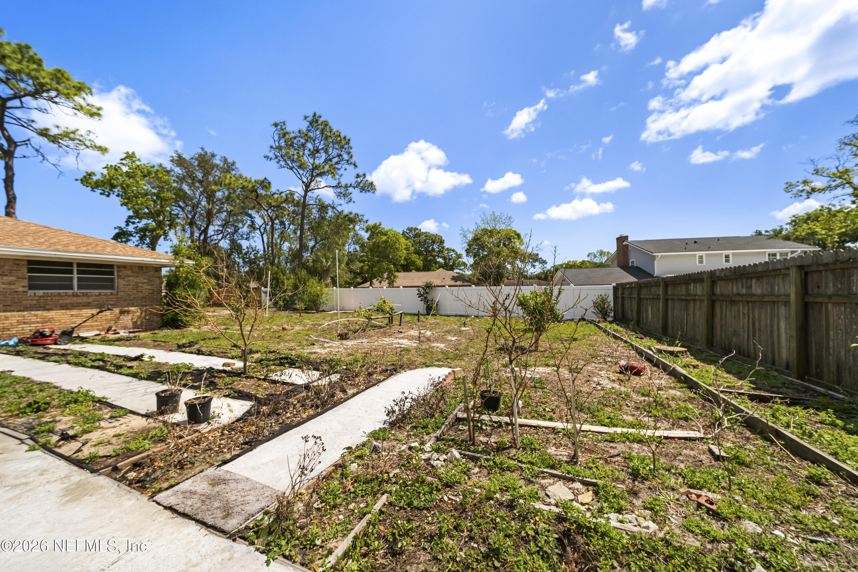 3571 Sandburg Road Jacksonville, FL 32277 - Photo 18 of 41 a view of a backyard