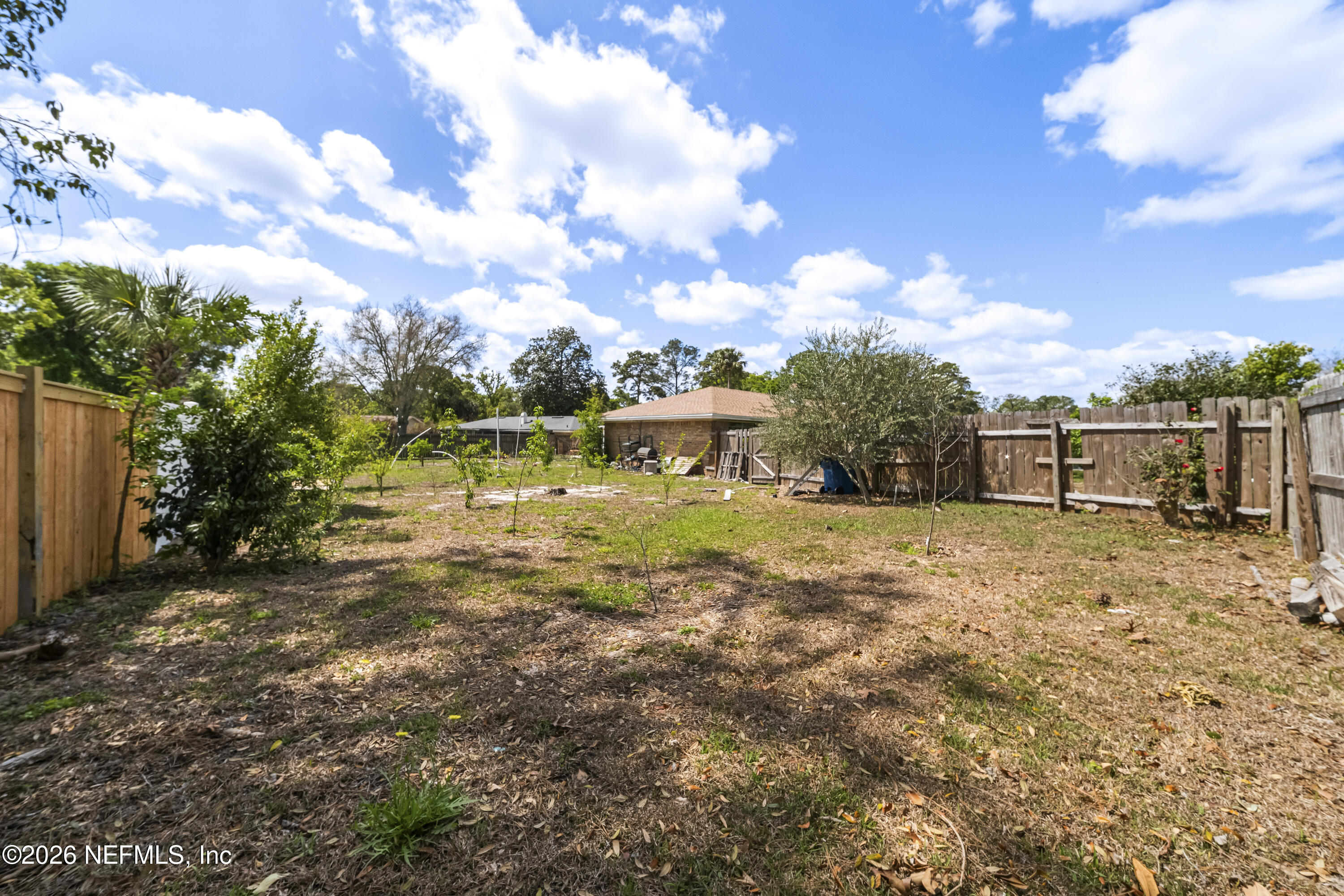 3571 Sandburg Road Jacksonville, FL 32277 - Photo 20 of 41 a view of a lake with houses