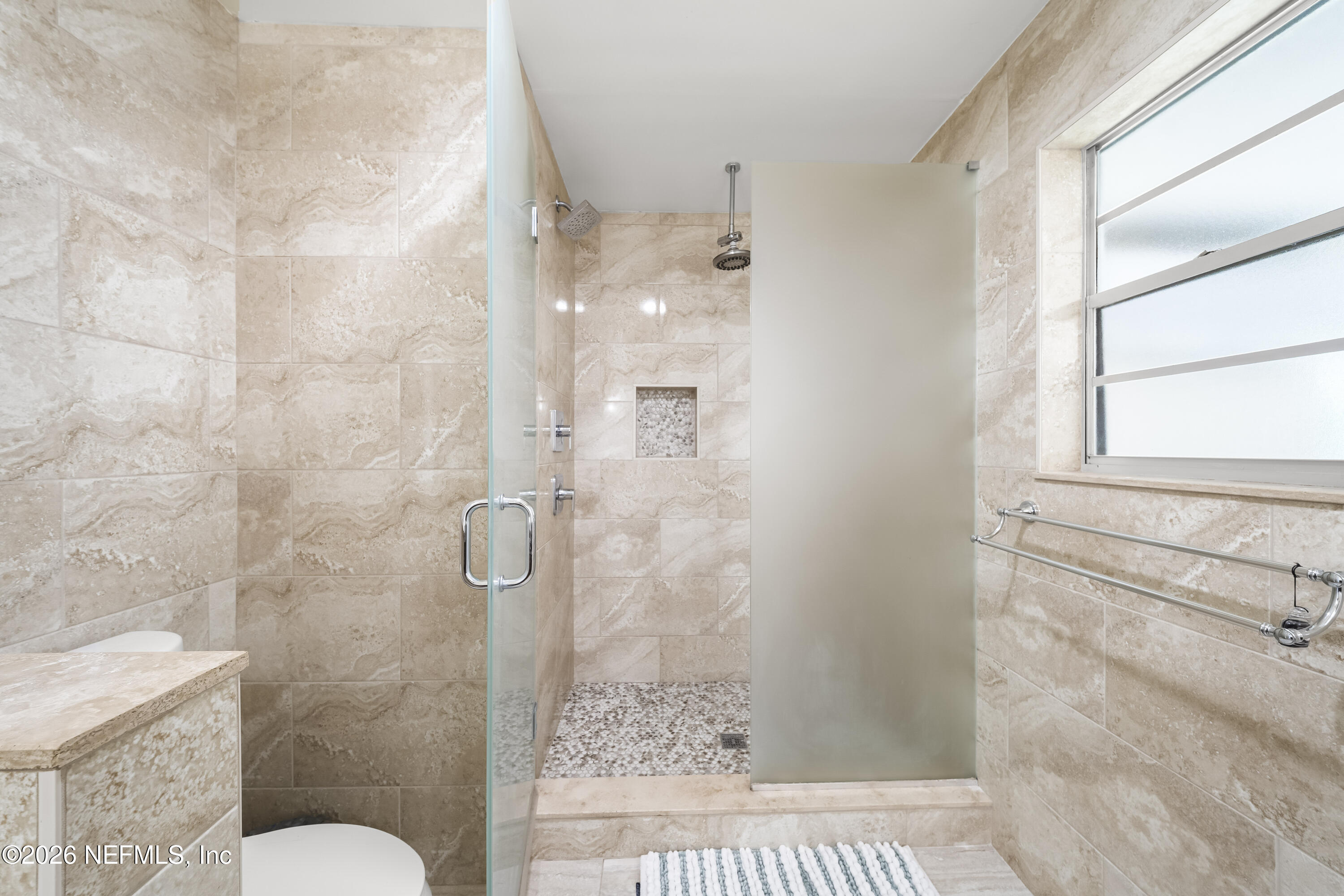 3571 Sandburg Road Jacksonville, FL 32277 - Photo 26 of 41 a bathroom with a shower