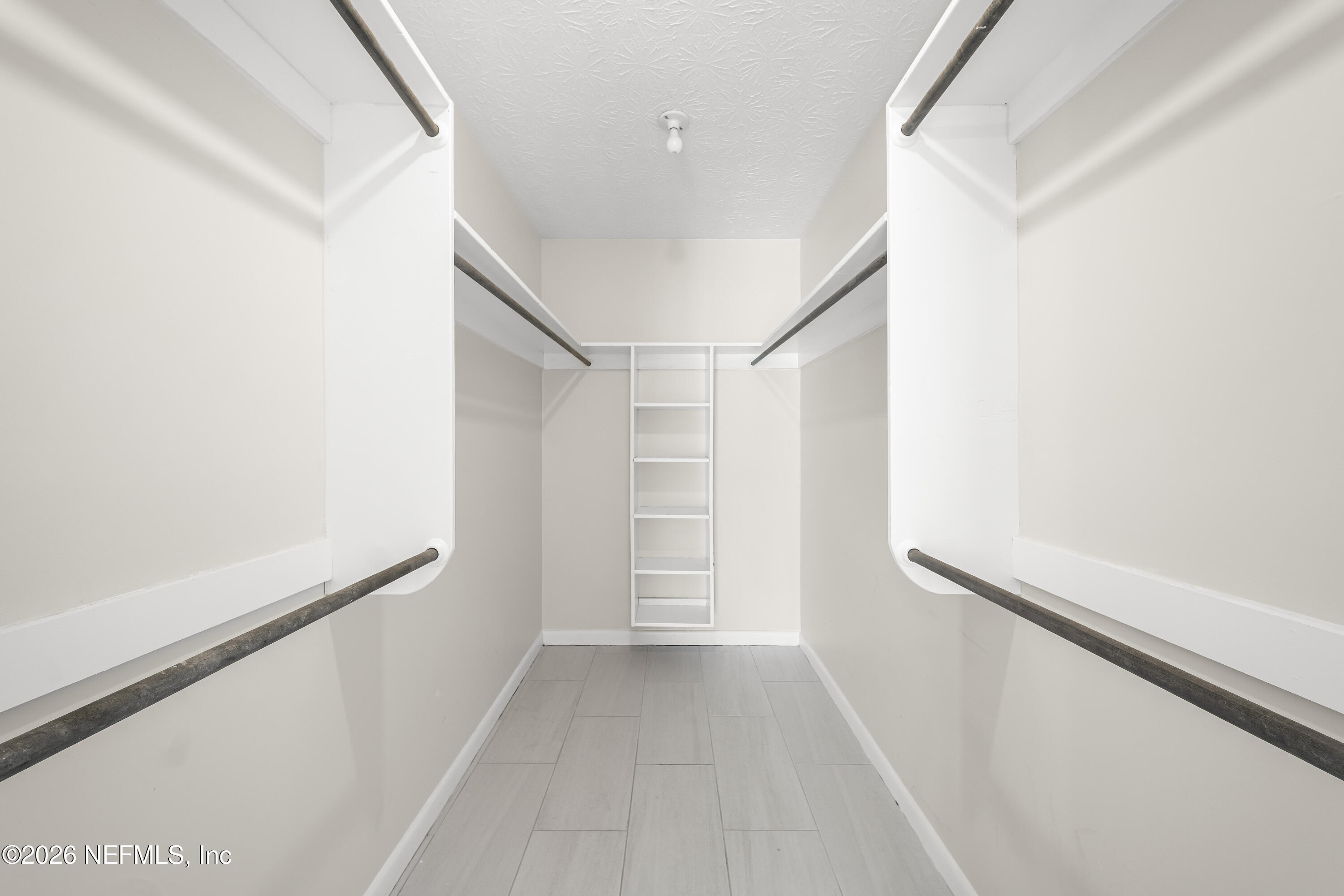 3571 Sandburg Road Jacksonville, FL 32277 - Photo 31 of 41 a view of a hallway