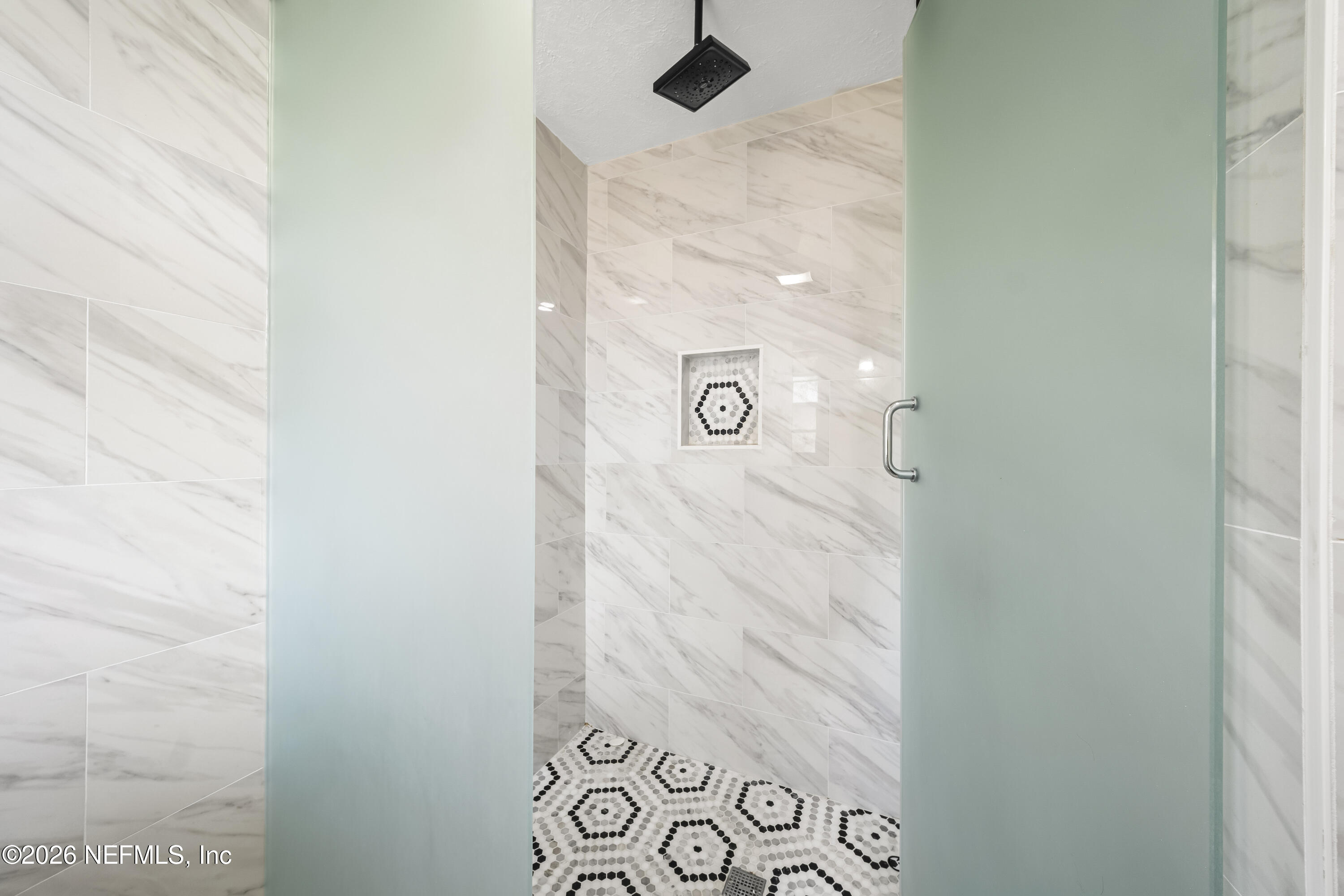 3571 Sandburg Road Jacksonville, FL 32277 - Photo 33 of 41 a bathroom with a shower