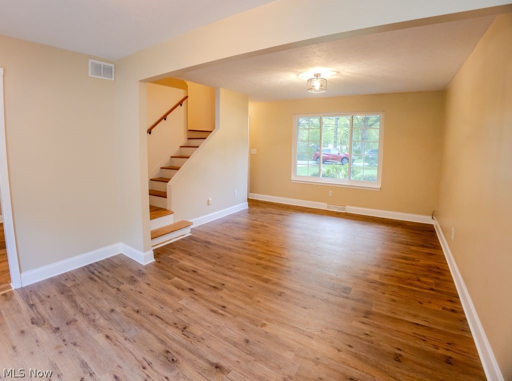 8828 Edgehill Road Mentor, OH 44060 - Photo 12 of 24 Spare room featuring hardwood / wood-style flooring