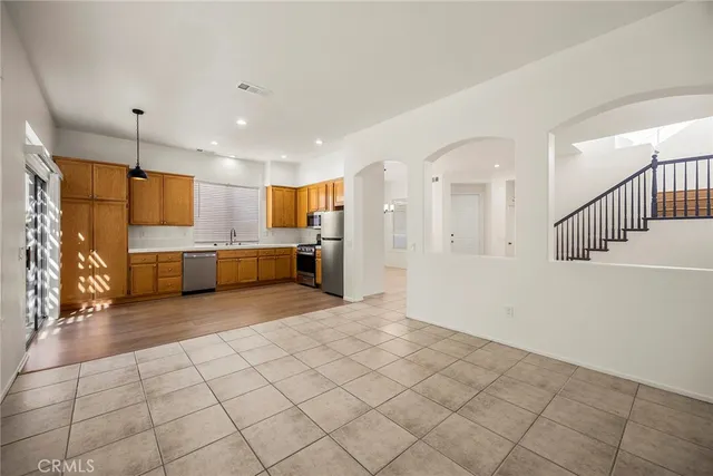 a view of a kitchen with furniture and a kitchen