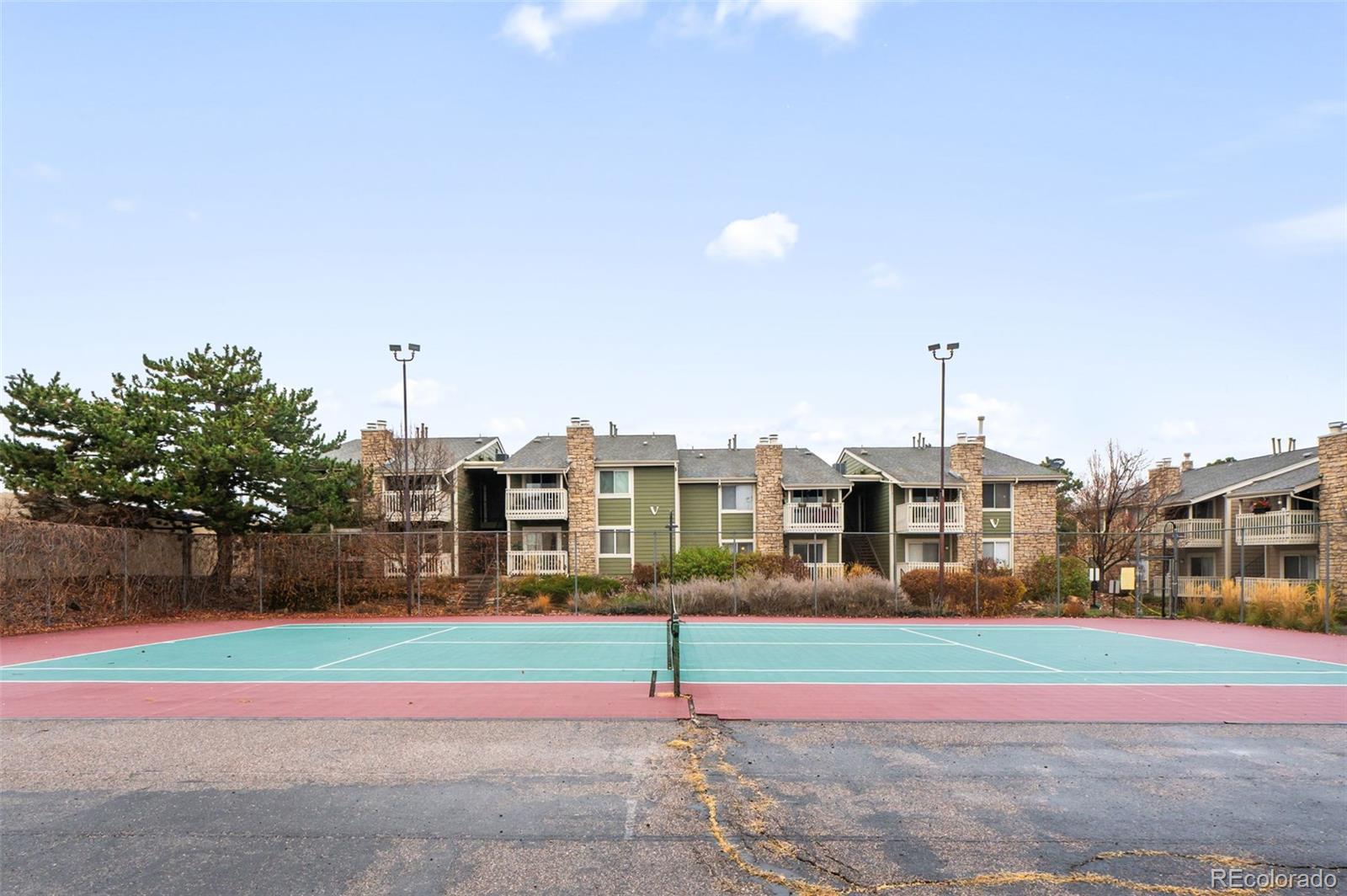 4400 South Quebec Street, Unit 102V Denver, CO 80237 - Photo 20 of 21 a front view of building with street