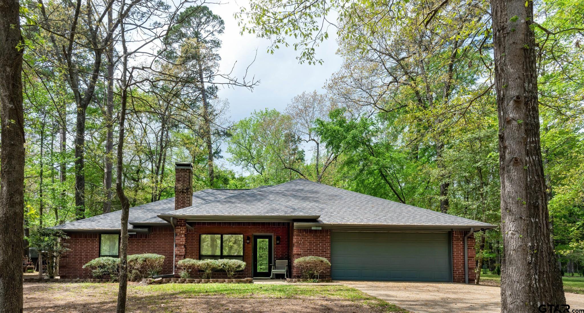 175 Old Gate Path Holly Lake Ranch, TX 75755 - Photo 1 of 28 a view of a house with a yard