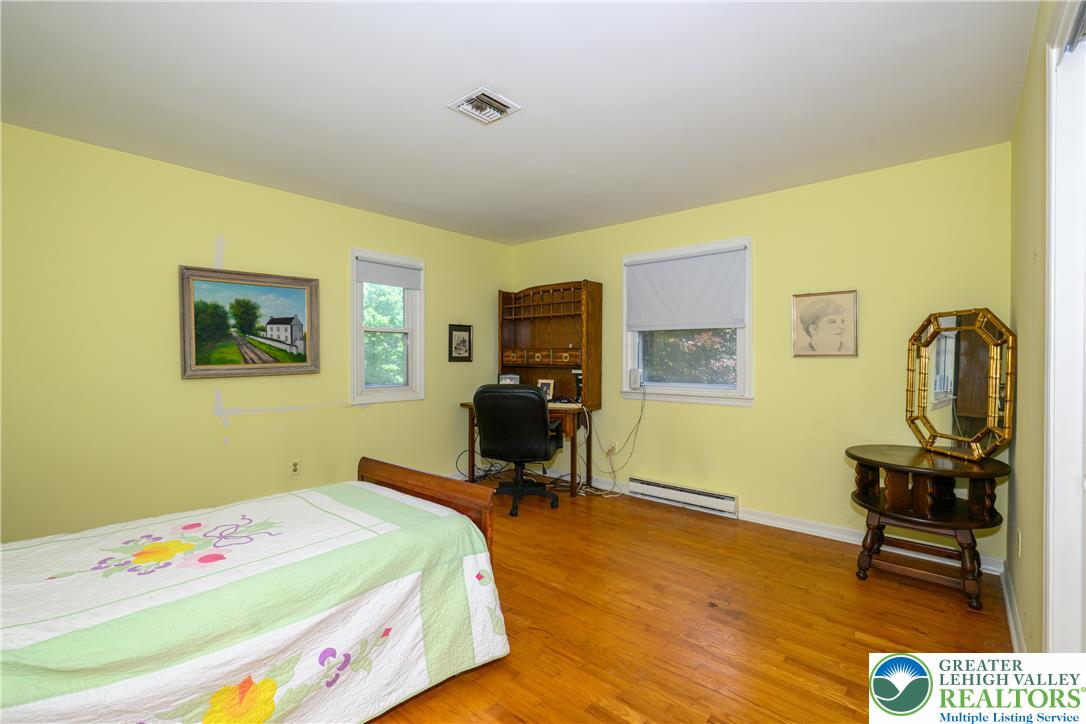 2516 Rachael Lane Orefield, PA 18069 - Photo 18 of 45 Hardwood flooring extends throughout this naturally illuminated bedroom with multiple windows.