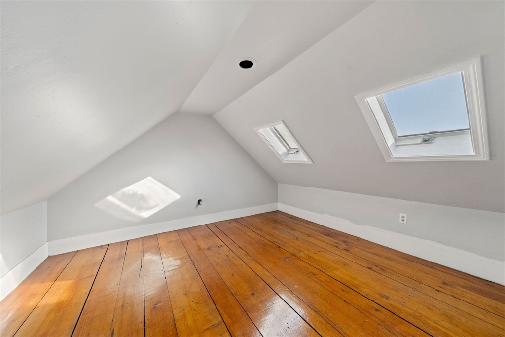 86-88 Pearl Street Boston, MA 02129 - Photo 29 of 30 a view of empty room with wooden floor