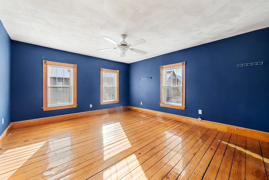 86-88 Pearl Street Boston, MA 02129 - Photo 6 of 30 a bedroom with a bed and window