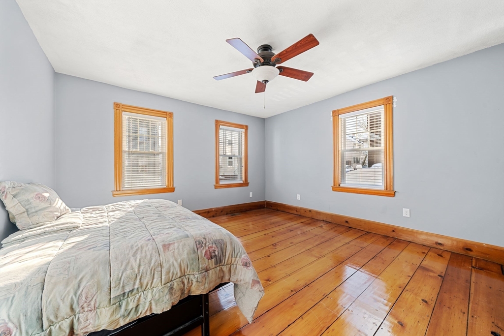 86-88 Pearl Street Boston, MA 02129 - Photo 8 of 30 a bedroom with a bed and a window