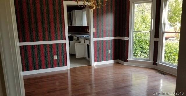 154 Brightmore Circle Rutherfordton, NC 28139 - Photo 3 of 7 wooden floor in an empty room with a window