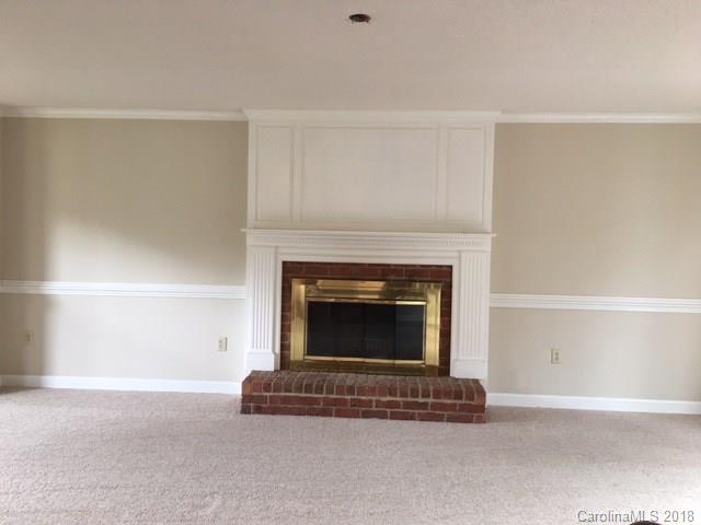 154 Brightmore Circle Rutherfordton, NC 28139 - Photo 4 of 7 a living room with a fireplace