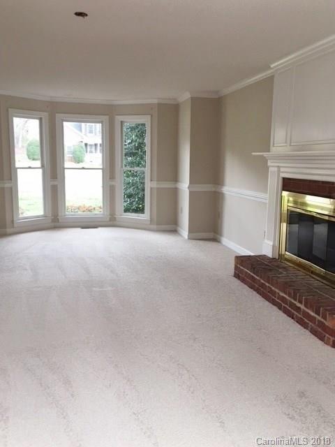 154 Brightmore Circle Rutherfordton, NC 28139 - Photo 5 of 7 a view of empty room with a fireplace