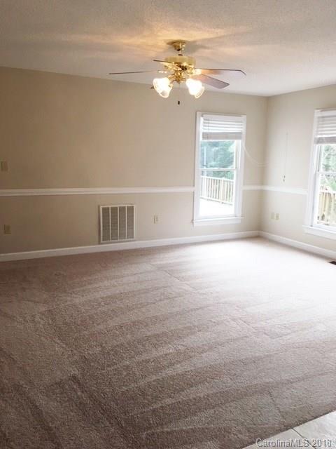 154 Brightmore Circle Rutherfordton, NC 28139 - Photo 6 of 7 a view of an empty room with a window