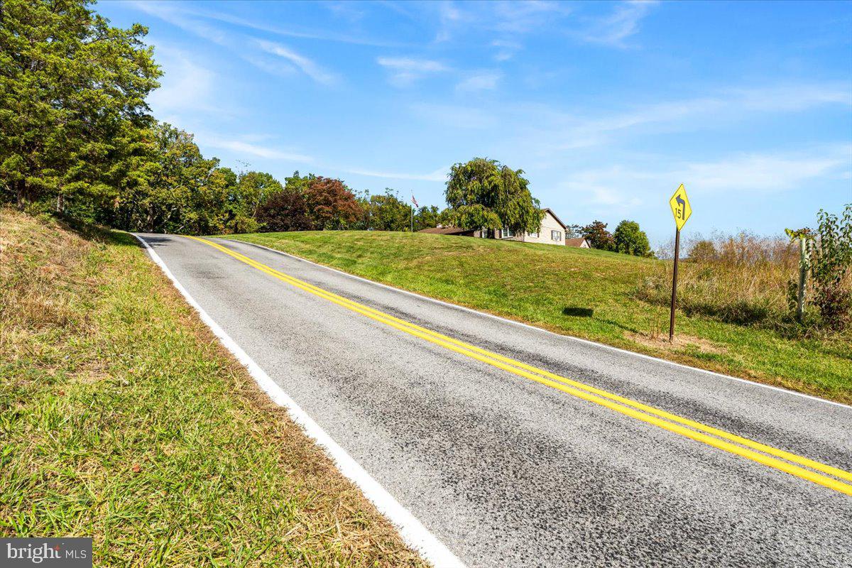 4014 Resley Road Hancock, MD 21750 - Photo 3 of 39 a view of a yard and ocean view